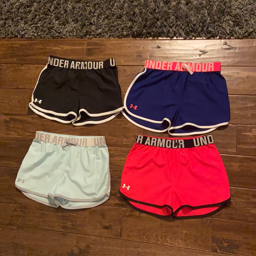 Four Under Armour Shorts